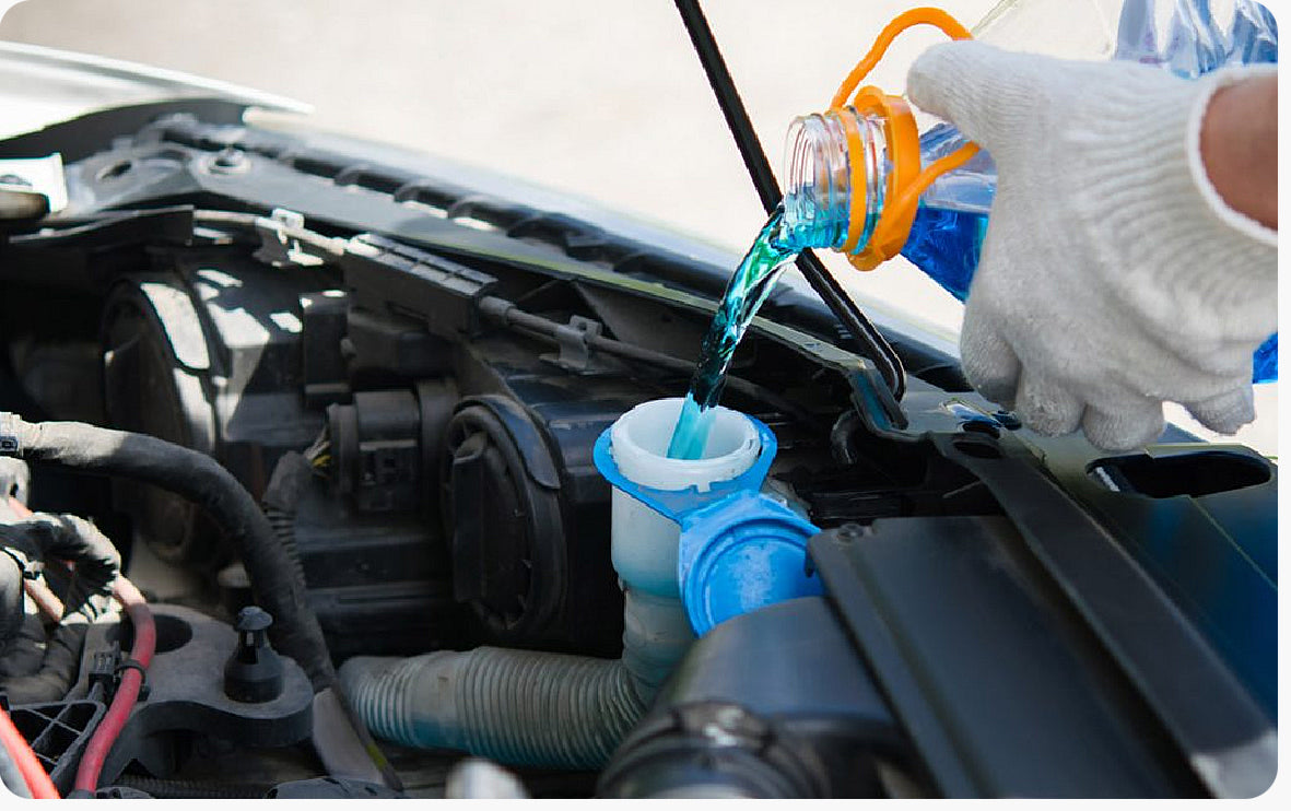 غسالة الزجاج الأمامي مع مادة مضادة للتجمد